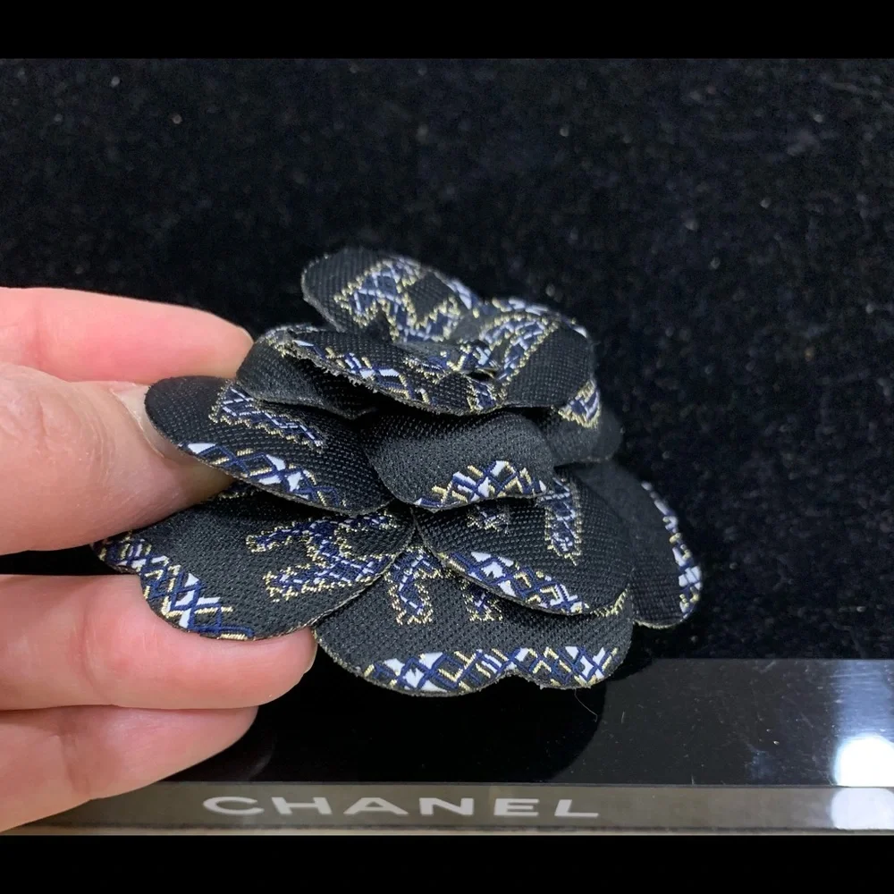 CHANEL Black Camellia Flower Brooch with Gold & Blue Stitching